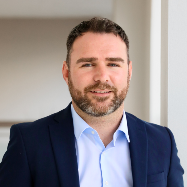 Headshot of ADAM HUDGEON