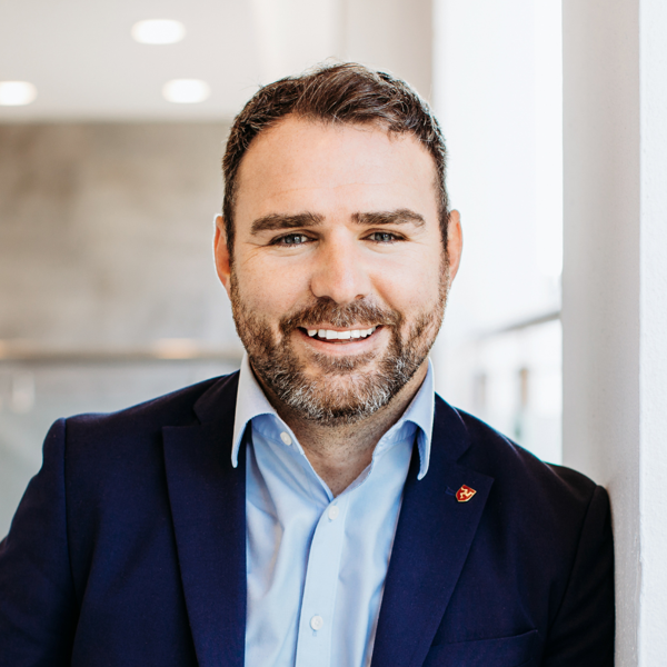 Headshot of ADAM HUDGEON